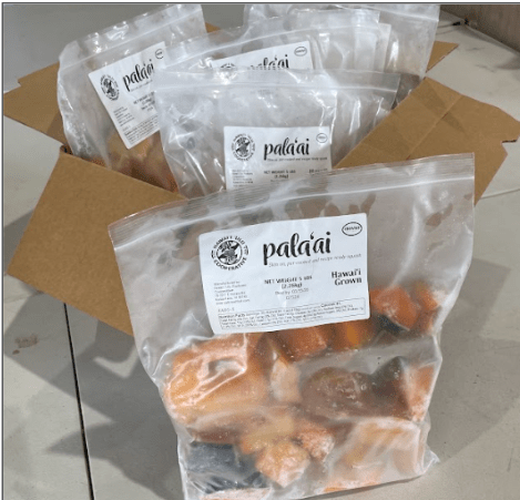 Sealed bags of frozen chopped palaʻai (winter squash)